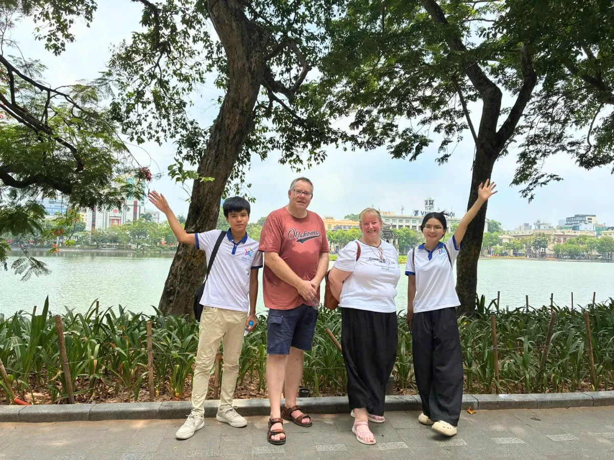 A traveller in conversation with Vietnamese students in Hanoi