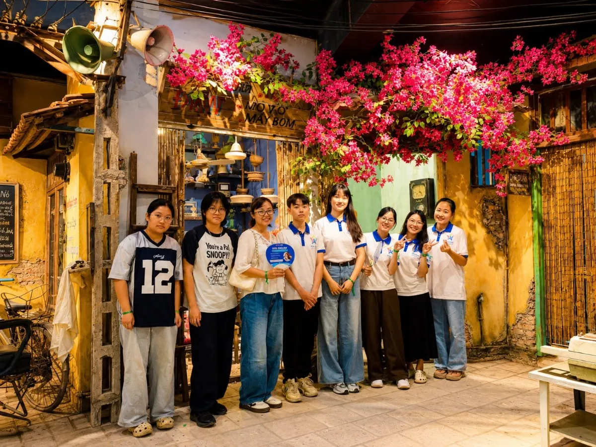 A local guide and a visitor planning a route together on a Customized Hanoi Tour