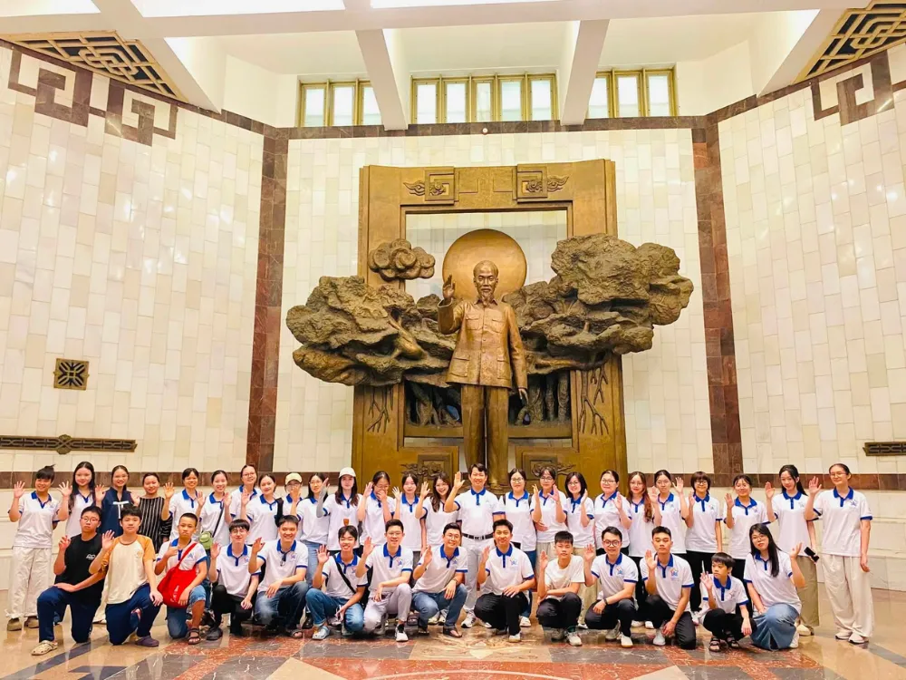Members of the Hanoi Free Private Tour Guide club at a group event