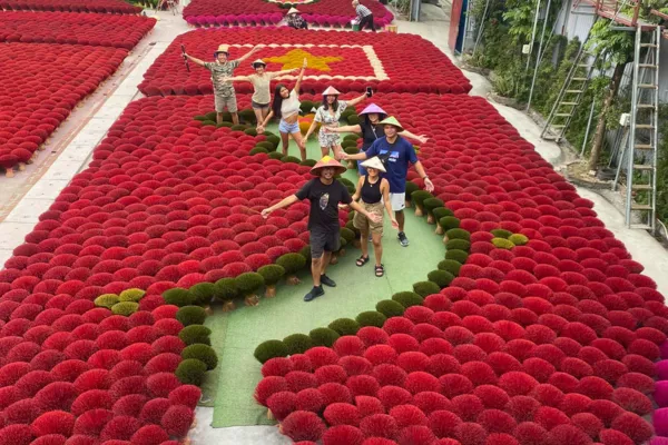 Bundles of red incense drying at a craft village near Hanoi