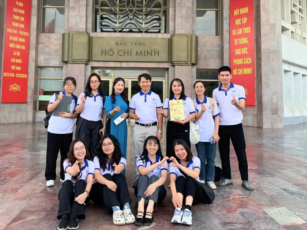 Members of the Hanoi Free Private Tour Guide club at a group event in Hanoi